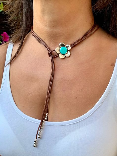 This beautiful leather necklace is handmade to order by me using  real leather cord- 2mm, silver plated flower with turquoise enamel colour (3x3cm), antique silver plated beads and silver plated clasp. 📌CARE INSTRUCTIONS:  - Leather jewellery should **NOT** come in contact with water. Please take this into consideration when taking a shower, swimming etc. This is important to keep the leather cord in good condition for as long as possible. - Please avoid contact with strong perfumes, lotions, c Boho Jewelry Diy Necklaces, Handmade Jewellery Ideas, Boho Leather Necklace, Leather Cord Jewelry, Boho Jewelry Diy, Macrame Colar, Leather Jewelry Diy, Leather Jewellery, Boho Jewellery