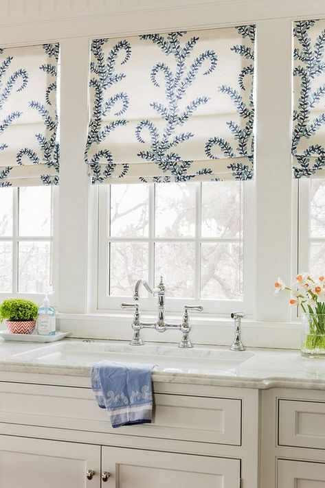 Window treatments in a kitchen add pattern and shade. Kitchen Roman Shades, Kitchen Window Design, Kitchen Window Curtains, Kitchen Blinds, Kitchen Window Treatments, Hus Inspiration, Coastal Interiors, Kitchen Window, Kitchen Curtains