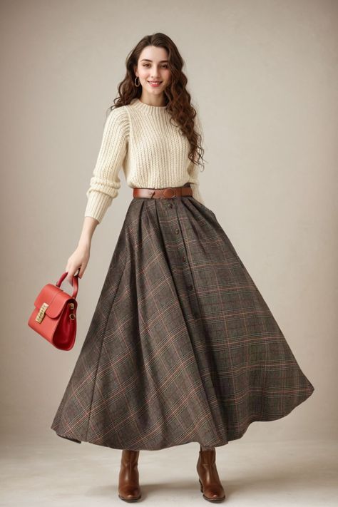 This winter wool skirt is a classic piece of tailoring that will see you through rain or shine. It is cut with a flattering flared skirt to give you a wonderful shape. The winter skirt is perfect classic styling and ends at the ankle. This is a versatile skirt that you'll wear again and again. DETAILS: * 30% wool, 30% fiber, 40% polyester * fully satiny liner * Two side pockets * Buttons closure * has belt loops to keep everything in place  * Plus size full skirt * Ankle length skirt * Perfect for Winter, autumn MODEL SIZE Bust 85 cm(33.4") Waist 67 cm(26.7") Height 168cm (5' 6") She wears size XS SIZE GUIDE Size vary between Brand and Country Please get your body measurement with our Size Guide And Find your size in our Size Chart Size Guide https://etsy.me/3d3EmoM SIZE CHART  https://ets Plaid Maxi Skirts, Womens Winter Skirt Outfits, Wool Long Skirt, Winter Wardrobe Aesthetic, Autumn Long Skirt Outfit, Autumn Maxi Skirt Outfit, Denim Flare Skirt Outfit, What To Wear With Long Skirts, Korean Style Dress Elegant