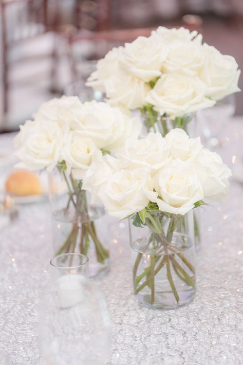 White Roses Centerpieces Long Tables, White Roses Centerpieces Simple, Round Table Centerpieces White Roses, White Rose Wedding Centerpieces Simple, Simple Rose Wedding Centerpieces, White Garden Rose Centerpiece, Ivory Flower Centerpieces, White Rose Centerpiece Wedding Simple, White Rose Centrepiece