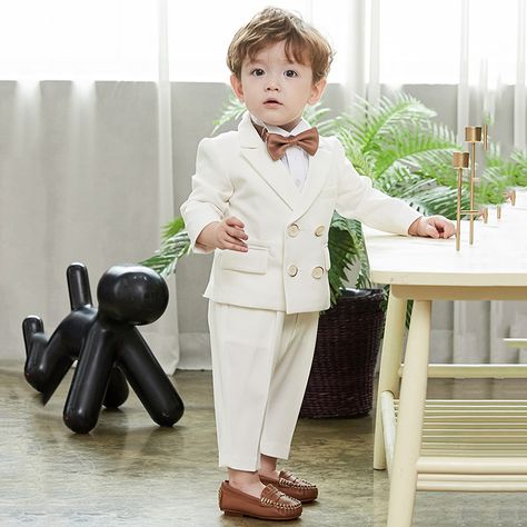 Boys' 3-Piece Tuxedo Set with Dress Shirt, Jacket, and Pants - 90cm Button closure YOUR SON WILL LOVE IT: This kids tuxedo can be used for a boy ring bearer outfit or a wedding suit for boys GREAT VALUE: This tuxedo for boys comes with 3 pieces. 1 button dinner jacket, shirt, pants GOOD QUALITY: This kid tuxedo is made with 100% polyester; the shirt is made with 65% polyester 35% cotton; Pleats on the long sleeve tuxedo shirt; CLASSIC AND FASHIONABLE: This tuxedo for boys is a modern twist based 1st Birthday Outfit Boy, Suit For Boys, Wedding Outfit For Boys, Boys Birthday Outfits, Kids Dress Boys, 1st Birthday Dresses, Wedding Dresses For Kids