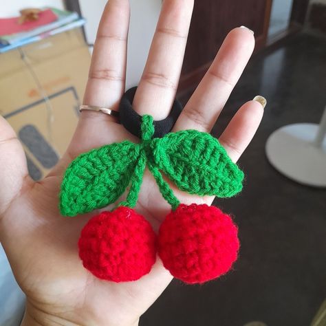 Crochet cherry rubber band🍒🍒 Crochet Rubber Bands, Rubber Band Hairstyles For Kids, Easy Crochet Tops, Rubber Band Hairstyle, Band Hairstyles, Rubber Band Hairstyles, Gauntlet Gloves, Tutorial Ideas, Hair Rubber Bands