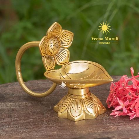 Buy antique styled brass artefacts and traditional wooden arts online - Veena Murali Decors Brass Items For Pooja, Silver Idols For Pooja, Vilakku Decoration, Brass Decor Indian, Aarti Thali, Puja Decor, Brass Diyas, Puja Mandir, Diya Decoration Ideas