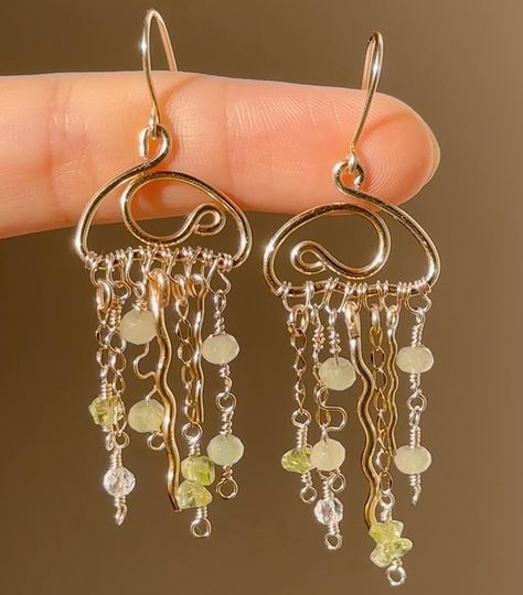 it’s the season of change!! i really want to try something new for the rest of the year, i want to make more intricate earrings and pendants which will all be limited pieces, like this jellyfish! hope you love these pieces x These super cute earrings are for ₹799! Prehnite and Peridot Crystals I’m so excited about the next few drops, can’t wait to post them🤍 #wirejewelleryindia #namenecklaceindia #mysteryboxindia #wireearrings #wireearringsindia #wireworkjewelry #smallbusiness #smallbusine... Wire Mushroom Earrings, Wire Mushroom, Intricate Earrings, Season Of Change, Wire Wrapping Tutorial, Wire Jewellery, Peridot Crystal, Earring Ideas, Fun Easy Crafts