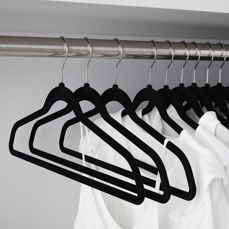 How to Make Your Walk-In Closet a More Stylish and Functional Space | Tiny details matter, so that collection of tangled hangers are killing your walk-in closet vibe. A complete overhaul of matching hangers is an easy way to elevate the space and foster better organization habits.  #declutter #organizationtips #realsimple #declutterideas #howtoclean #homeorganization Black Velvet Hangers, Smart Room, Black Hangers, Skirt Hangers, Walk In Closet Design, Suit Hangers, Velvet Hangers, Pant Hangers, Coat Hangers