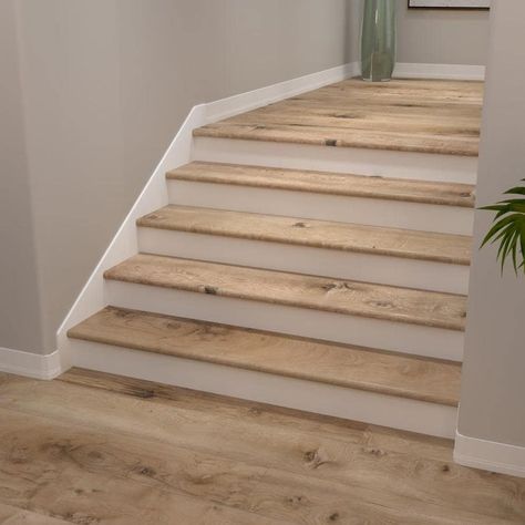 Lvp Stairs With White Risers, Light Oak Vinyl Plank Flooring, Lvp Flooring On Stairs, Lvp Stairs, Lvp Flooring Planks, Stairwell Landing, Stairway Remodel, Vinyl Stair Treads, Stairs Makeover Design