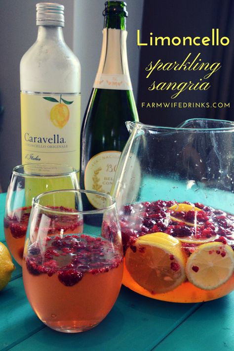 Limoncello Sparkling Sangria - The Farmwife Drinks Limoncello Sangria Recipe, Lemon Cello Recipe, Lemon Sangria, Sangria Party, Sparkling Sangria, White Sangria Recipe, Limoncello Recipe, Rose Sangria, Frozen Raspberries