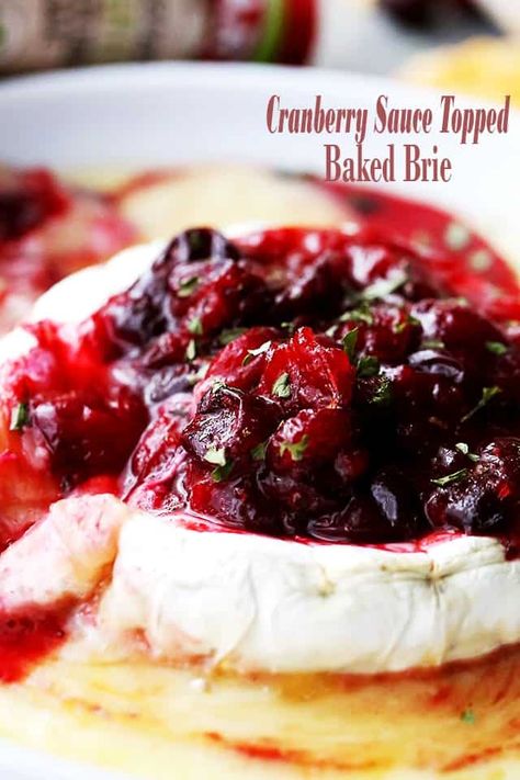 Cranberry Sauce Topped Baked Brie is delicious, easy & the perfect appetizer for your holiday party! A warm & gooey baked brie topped with cranberry sauce! #brie #bakedbrie #appetizer #christmas #thanksgiving Brie Toppings, Baked Brie Cranberry, Cranberry Baked Brie, Brie Fondant, Cranberry Appetizer, Baked Brie Appetizer, Baked Brie Recipe, Brie Cranberry, Baked Brie Recipes