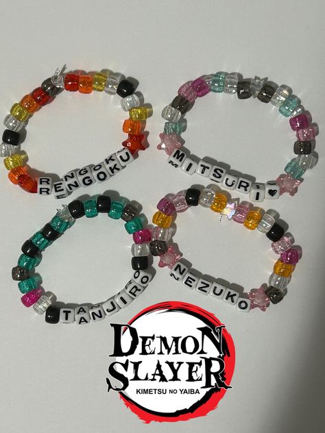 Bracelets I made based off of the characters from Demon Slayer! These bracelets are well made, containing 27-28 beads, are colorful, and are stretchy so they can fit everyone! Mha Bracelet Ideas, Demon Slayer Bracelet Ideas, Bracelet Ideas Characters, Kny Bracelets, Demon Slayer Friendship Bracelet, Character Kandi Bracelets, Kandi Bracelets Matching, Anime Friendship Bracelets, Pokémon Bracelet