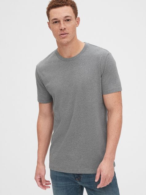 Soft cotton jersey.  Crewneck.  Short sleeves.  Standard fit.  Slim through the chest and shoulders.  Hits at the hip.  Colin in black, blue) is 6'2"/188cm with 32"/81cm waist and 32"/81cm inseam wearing regular Gap Grey Tshirt, Plain Shirt, Grey T Shirt, Plain Shirts, Loungewear Shorts, Men Boys, Cotton Shorts, Men Fashion, Hollister