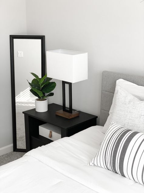 Black Bed Frame And Night Stands, White Headboard Black Nightstands, White Nightstand Bedroom Decor, Black Nightstand Aesthetic, Nightstand Plant Decor, Black Nightstand Lamp, Black Table Lamp Bedroom, Black Nightstand Styling, White Bed Black Nightstand