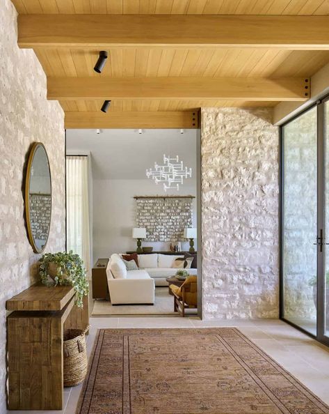 Step inside this gorgeous stone house in Texas inspired by live oak trees House In Texas, Concrete Stained Floors, Limestone Wall, Live Oak Trees, Oak Trees, Live Oak, Commercial Architecture, Texas Homes, Stone House