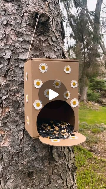 Tara Rondinelli on Instagram: "The sweetest spring bird feeder🥰 I suggest using homemade/edible glue for the pressed flowers to avoid toxins♥️ Have any questions about how to make it? Let me know your questions below!  #cardboardcrafts #reducereuserecycle #springcrafts #springcraftsforkids #diybirdfeeder #birdfeedercraft #forestschool #naturepreschool #kidscrafts #craftsofinstagram" How To Make Bird Feeders Homemade, How To Make Bird Feeders, Birds Arts And Crafts For Kids, How To Make A Bird Feeder, Diy Bird Feeders Homemade, Bird Feeders Diy Homemade, Bird Feeders Diy Kids, Homemade Bird Feeder, Bird Feeders Diy