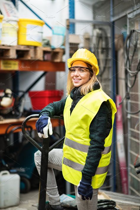 Young female worker in a warehouse. by HalfPoint on @creativemarket Warehouse Worker Outfit, Caucasian Clothes, Factory Work, Warehouse Worker, Abstract Christmas, Outfit Women, Work Wear Women, Woman Standing, Ladies Day