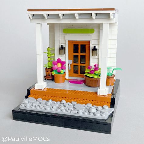 Look closely at the model of a front porch by LEGO builder PaulvilleMOCs, there is more to this model than meets the eye. Disney Lego Ideas, Lego Door, Lego Design Ideas, Lego House Ideas, Lego Furniture, Lego Club, Lego Diy, Lego Animals, Lego Lovers