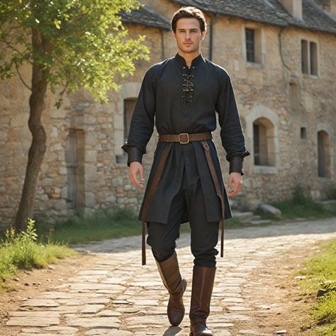 Introducing our sleek Black Medieval Shirt for those in love with historical regalia and superior craftsmanship. This classic design shirt has a loose fit, high collar, and buttoned front to complement Renaissance fairs, historical reenactments, or any other special events looking for a touch of unique taste in attire. With passion, every T-shirt is manufactured under the watchful eyes of skilled workers to ensure we deliver only quality products to our buyers. The soft, long-lasting material an Middle Ages Fashion Men, Medieval Groom Attire, Male Witch Aesthetic Fashion, Midevil Outfits Man, Knight Outfit Men, Male Witch Costume, Medieval Fashion Men, Medieval Cowboy, Mens Ren Faire Outfit