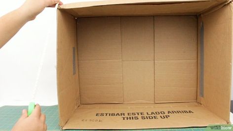 3 Ways to Make a Cardboard Dollhouse - wikiHow Cardboard Box Doll House Diy Easy, Cardboard Dollhouse Diy How To Make, Dollhouse Out Of Cardboard Boxes, Diy Barbie House Cardboard Boxes, Barbie House Diy Cardboard, Cardboard Box Dollhouse, Barbie Doll House Diy Cardboard, How To Make A Doll House With Cardboard, Dollhouse Diy Ideas Cardboard Boxes