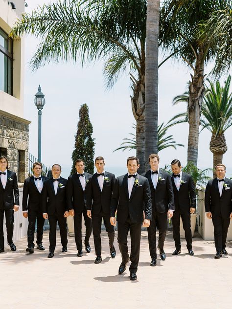 Groomsmen in black tux at southern california beach wedding Tux Beach Wedding, Bel Air Bay Club Wedding, Groomsmen In Black, Groomsmen Black, Beach Wedding Groomsmen, California Beach Wedding, Southern California Beaches, Black Tux, California Beach