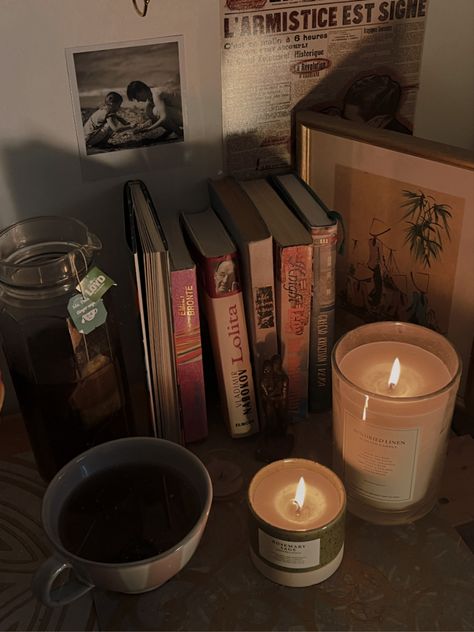 Fall Inspo Room Decor, Books On Nightstand Aesthetic, Autumn Aesthetic Living Room, Fall Nightstand Decor, Books And Candles Aesthetic, Moody Autumn Aesthetic, Fall Aesthetic Candles, Fall Books Aesthetic, Autumn Hygge Aesthetic