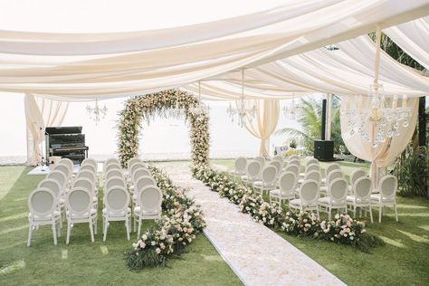 Nothing will stop this lush Phuket wedding from being number 1 in our hearts! A ceremony arch abundant with blooms, a gown dusted with gems and the cutest little page boys we ever did see, you will do yourself a favor to see more of this seaside garden wedding. The wedding cabana you see here is just a little taste! #ruffledblog Outdoor Wedding Aisle Decorations Summer, Garden Wedding Ceremony Arch, Tent Wedding Ceremony, Wedding In Garden, Wedding Cabana, Garden Wedding Gown, Wedding Garden Decoration, Outside Wedding Ceremonies, Ceremony Decorations Church