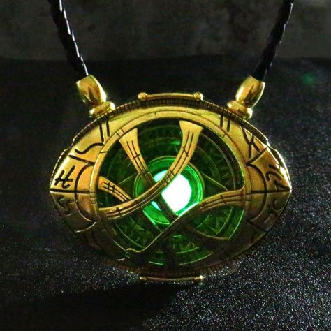 Eye+of+Agamotto+(Doctor+Strange)+by+Remanater. Eye Of Agamotto, Marvel Jewelry, Cape Outfit, Time Stone, Marvel Coloring, Cosplay Jewelry, Glow In Dark, Dr Strange, Bronze Pendant