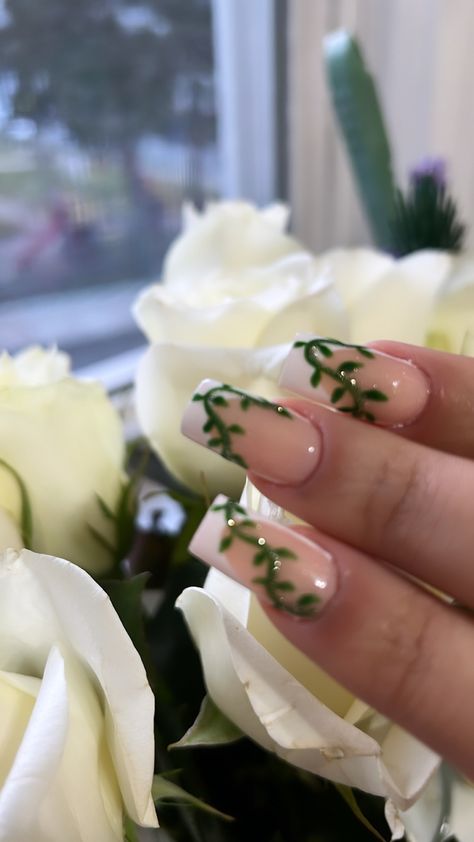 White french tips with vines French Tip Nails With Vines, White French Tip Nails With Green Flowers, Vine Acrylic Nails, Vines On Nails, Vines Nails, Vine Nails Designs, Nails With Vines, Green Vine Nails, Forest Nails Designs