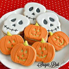 Halloween Cookies - Sugar Dot Cookies . . . Here to teach you how to decorate cookies, provide the best cookie supplies, and help you to start or grow your cookie business! Halloween Skull Cookies Decorated, Sugar Skull Cookies Royal Icing, Skull Sugar Cookies Decorated, Skull Cookies Royal Icing, Sugar Skull Cookies Decorated, Skull Cookies Decorated, Halloween Iced Cookies, Skull Cookie Decorating, Decorating Halloween Cookies