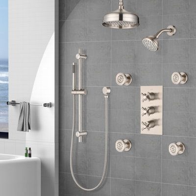 Indulge in multiple Shower , which includes body sprays, a hand shower, rainfall shower and a wall-mount shower. The hand held shower rests on a slim slide bar with a height-adjustable cradle. This luxurious set features a pressure balancing valve, which provides a consistent and safe temperature each time you use it. | eqloo Complete Shower System w / Rough-in Valve 8.0 W in gray in Brushed Nickel | 8" W | Wayfair EQAQL3805BN Shower Body Sprayers Master Bathrooms, Multiple Shower Heads Master Baths, Bathroom Esthetics, Shower Body Sprayers, Shower Rainfall, Multiple Shower Heads, Bathroom Vanity Designs, Adjustable Shower Head, Shower Fixtures