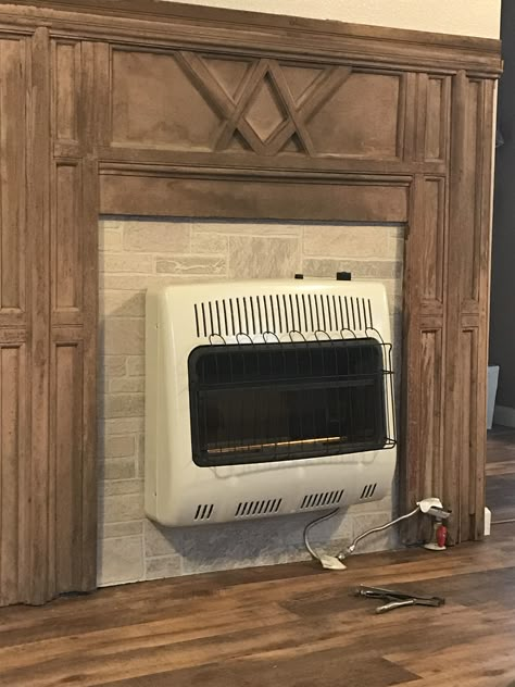 Vintage mantle with gas heater. Repurposed mantle Gas Wall Heater Makeover, Gas Heater Fireplace, Wall Heater Cover, Propane Gas Fireplace, Propane Wall Heaters, Wall Heater, Faux Fireplace Mantels, Fake Fireplace, Basement Remodel Diy