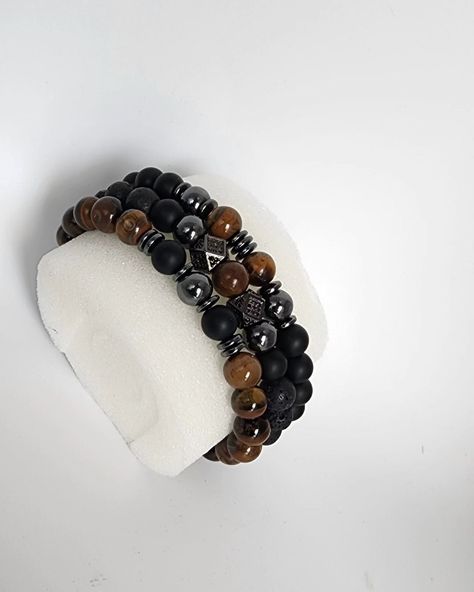 Onyx is known for its protective and grounding benefits while tiger eye beads are believed to bring balance and good fortune. Together, they create a harmonious blend of style and meaning, ideal for the modern man who values both aesthetics and symbolism. # OnyxBeadBracelet #fathersdaygifts #TigerEyeBead #HematiteJewelry #Men'sBracelet #Women'sBracelet #UnisexJewelry #BeadedJewelry #HandmadeBracelet #GiftforHim #GiftforHer #StretchBracelet #HealingStones Grounding Benefits, Hematite Jewelry, Candy Bracelet, Trending Bracelets, Tiger Eye Beads, Eye Beads, Unisex Jewelry, Bracelet Crafts, Good Fortune