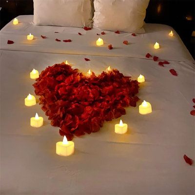 1000 PCS beautiful artificial fake rose petals and 24 pcs LED heart shape flameless candles, to create your own romantic surrounding and spend a happy night with your lover/wife Proposal Decorations, Romantic Night Wedding, Rose Project, Wedding Night Room Decorations, Enchanted Forest Wedding Theme, Rose Petal Candle, Fake Rose Petals, Led Heart, Happy Night