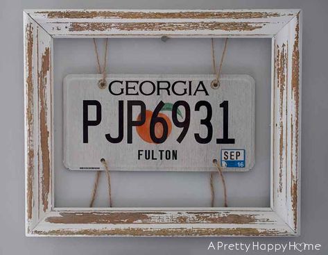 Frame a license plate with twine stapled to the inside of a glassless frame. License Plate Framed, Display Old License Plates, Framed License Plates, License Plate Ideas Room Decor, How To Display License Plates, Framed License Plate Wall Art, License Plate Wall Art, License Plate Wall Ideas, License Plate Display