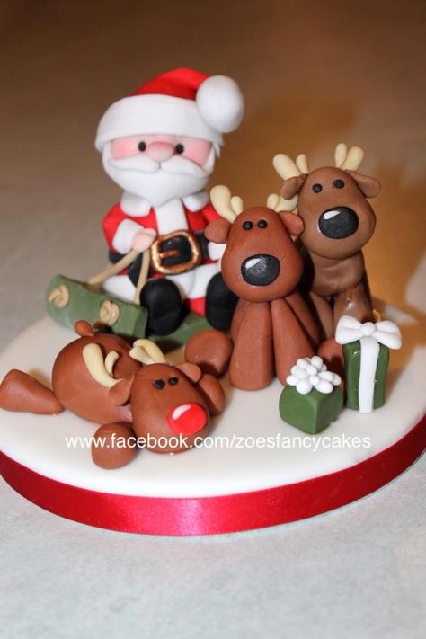 Santa and a few of his reindeer - Cake by Zoe's Fancy Cakes more at https://www.facebook.com/zoesfancycakes Fancy Cake Toppers, Zoes Fancy Cakes, Xmas House, Reindeer Cakes, Santa Cake, Christmas Cake Designs, Christmas Cake Topper, Fondant Animals, Christmas Topper