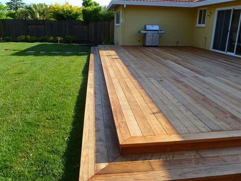 Low deck with two steps. I love how this is simple, level and runs nearly the length of the house. SO much room for entertaining! Deck With Steps, Backyard Patio Deck, Low Deck, Large Backyard Landscaping, Patio Grande, Deck Building, Grill Area, Wooden Deck, Patio Deck Designs