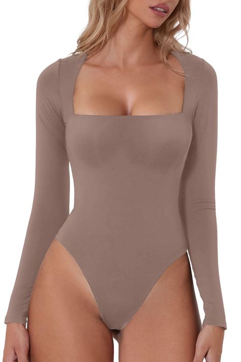 PRICES MAY VARY. Material:Designed in our premium polyamide high-stretch, and breathable fabric that¡¯s dual layered for a compressive fit, can be relied upon to create a flattering silhouette and and wraps itself around your body like a second skin. Feature:the square neck bodysuit features with a square neckline and curved shoulders for a bust flattering fit,Ultra versatile with a high cut, brazilian bottom that can be styled perfectly under jeans and trousers. This sculpting, smoothing square Long Sleeve Square Neck Top, Bodysuit With Skirt, Bodysuit Tops, Flare Jumpsuit, Square Neck Bodysuit, Bodysuit Top, Shapewear Bodysuit, Bodysuit Fashion, Tops Black