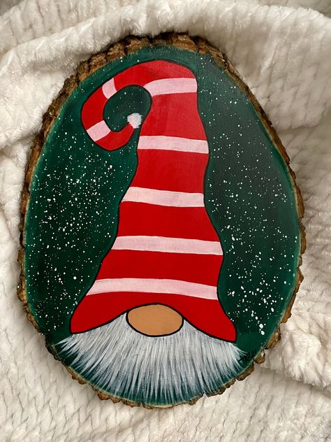 Red Christmas gnome on wood round approx 12x9in Tree Painted Rocks, Christmas Pebble Art, Christmas Canvas Art, Cuyahoga Falls, Christmas Craft Projects, Christmas Rock, Christmas Tree Painting, Rock Painting Patterns, Christmas Wood Crafts