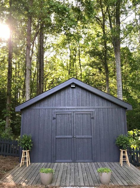 One Room Challenge Spring Backyard Makeover. Painted shed in dark color to have it blend well into the scenery. #diy #outdoor #shedideas #shed #backyard #backyardshed #oneroomchallenge #BestBackyardShedIdeas How To Finish The Inside Of A Shed, Cracked Pepper Behr Exterior, Behr Cracked Pepper Exterior Paint, Shed Paint Colours, Painted Garage, Spring Backyard, Black Shed, Painted Shed, Shed Landscaping