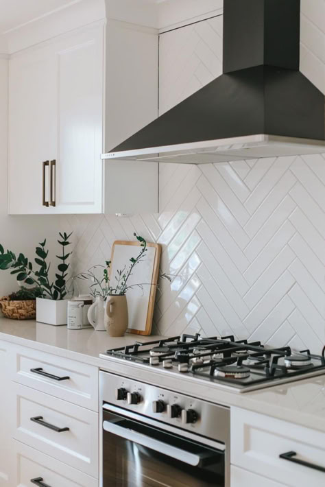 22 Herringbone Backsplash Subway Tile Ideas for a Modern Update White Chevron Backsplash Kitchen, Shaker Cabinets Kitchen White Subway Tile Backsplash, Herringbone Backsplash Subway Tile, Subway Backsplash Kitchen, Resurface Cabinets, Kitchen Subway Tile Backsplash, Herringbone Tile Kitchen, Subway Tile Backsplash Ideas, Subway Tile Ideas