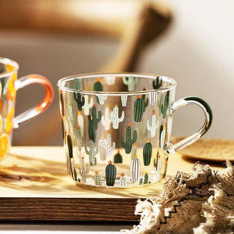 Drinking coffee or tea will never be boring again. Enjoy our wide range of high-quality glass and ceramic mugs from the best manufacturers on the globe. Glass Measuring Cup, First Home Gifts, Glass Mugs, Tea Milk, Glass Tea Cups, Painted Cups, Cactus Design, Milk Cup, Orange Fruit