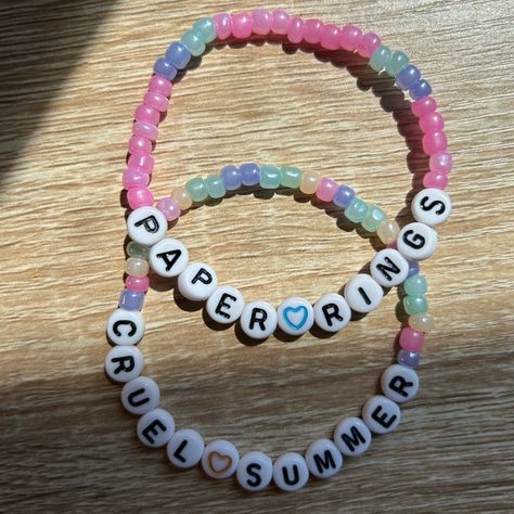 Funny Taylor Bracelets, Taylor Swift Bracelets Cruel Summer, Taylor Swift Bracelets Paper Rings, Lover Ts Bracelet, What To Make Out Of Perler Beads, Cruel Summer Bracelet Taylor Swift, Paper Rings Bracelet, Cute Eras Tour Bracelets, Taylor Swift Bracelets Colors