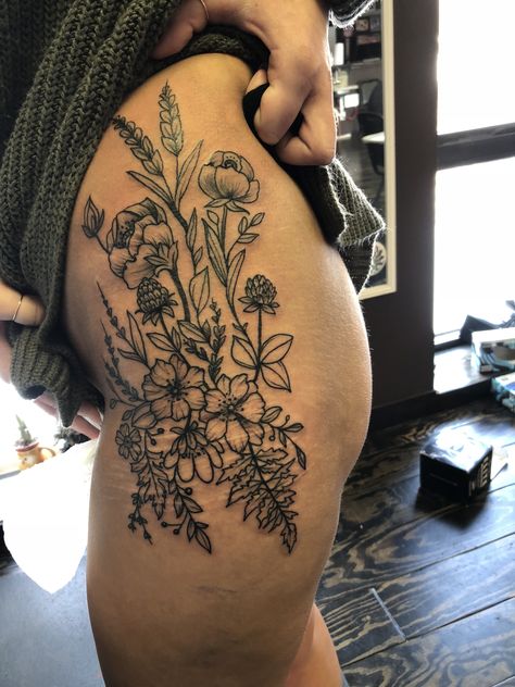 Boho Hip Tattoos Women, Side Thigh Cover Up Tattoos Women, Wild Flower Tattoo Thigh, Hip Tattoo Inspiration, Thigh Garden Tattoo, If You Go Down Im Going Down Too Tattoo, Wildflower Hip Tattoos Women, Hip Tattoo Wildflower, Large Wildflower Tattoo