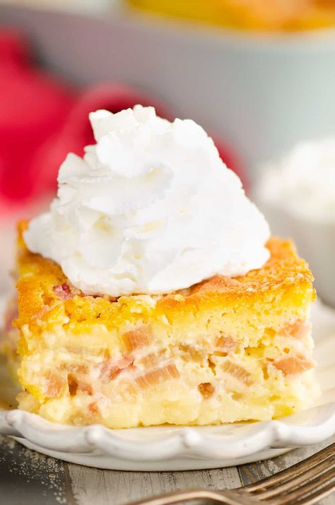 Easy 6 Ingredient Rhubarb Custard Cake is an easy dessert made with tart rhubarb, a sweet custard and a box mix cake for a simple and delicious recipe that anyone can make! #RhubarbCustard #RhubarbCake #YellowCakeMix Rhubarb Custard Cake, Custard Cake Recipes, Rhubarb Custard, Inside Cake, Rhubarb Desserts, Rhubarb Cake, Rhubarb And Custard, Custard Cake, Vegetarian Cake