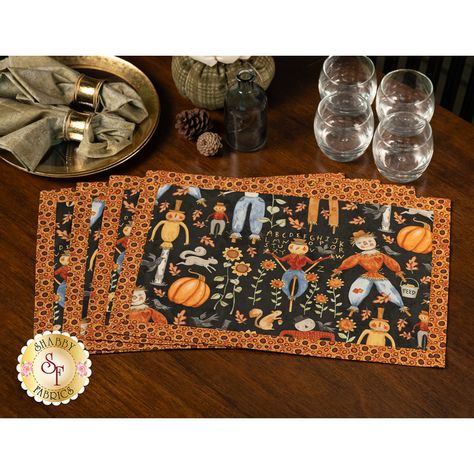 Set the table in style with these easy-to-sew, self-binding placemats! Featuring fun autumnal scarecrows, pumpkins and sunflowers on a dark background from the Bittersweet Farm collection from Riley Blake Designs, these fun placemats are perfect for traveling or setting out during the holidays. Each kit makes 4 placemats which measure approximately 12" x 18-1/2". This Kit Includes: Instructions All Fabrics To Create 4 Placemats Products Used: Creative Grids 4-1/2" x 8-1/2" Ruler - #CGR48 - Great Sewing Placemats, Fun Placemats, Easy Placemats, Valentine Day Video, Cordless Iron, Fall Placemats, Quilted Placemats, Free Pattern Download, Place Mats Quilted