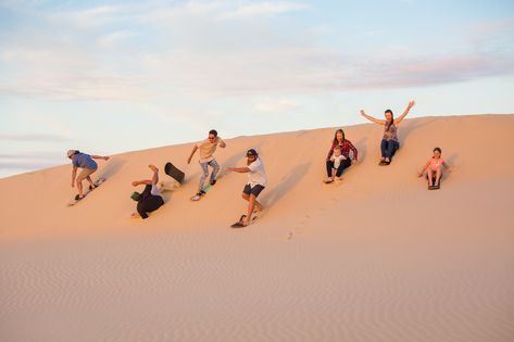 Sandboarding at Stockton Sand Dunes. We love sandboarding! So many hills, unlimited rides, and best of all, fun for the entire family. We look forward to showing you our backyard.  #stocktonsanddunes #portstephens #sandboarding #birubibeach #australia #annabay #4wdtoursrus #familyfun Surfing Photoshoot, Huacachina Peru, Sand Boarding, Desert Shoot, Quad Biking, 2023 Beach, Port Stephens, Desert Safari Dubai, Dubai Tour