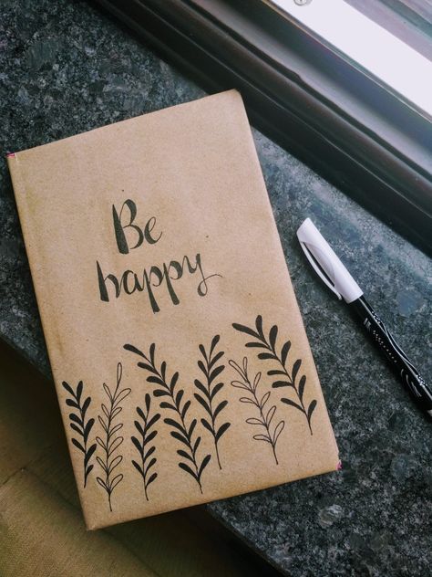 Happiness message and simple black pen art on brown paper diary Brown Book Cover Design, Black Pen Art Doodles Easy, Simple Diary Design, Simple Black Pen Drawing, Drawing On Brown Paper Ideas, Brown Notebook Cover Design, White Pen Art On Black Paper Easy, Black Pen Doodles Aesthetic, Black Pen Drawing Doodles