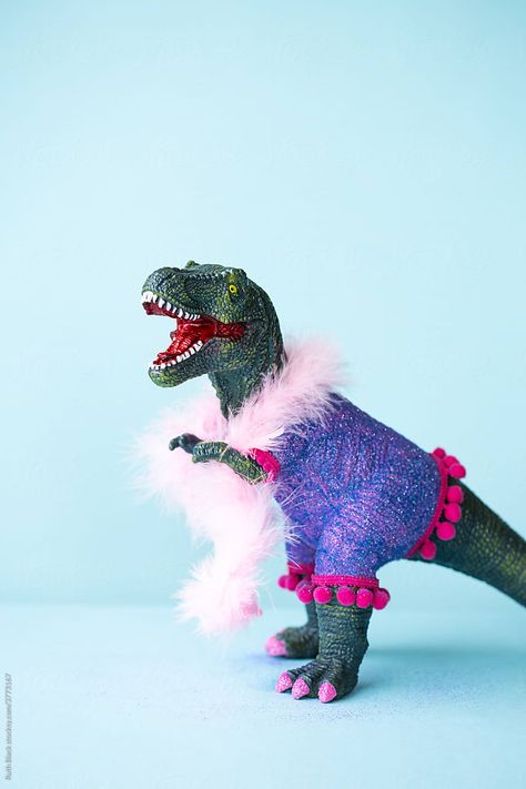 https://www.stocksy.com/3773167/toy-dinosaur-playing-dress-up Dinosaur Toy Aesthetic, Disco Dinosaur, Dinosaur Fashion, Toy Wallpaper, Plastic Animal Crafts, Toy Dinosaurs, Black Dinosaur, Plastic Dinosaurs, How To Remove Warts