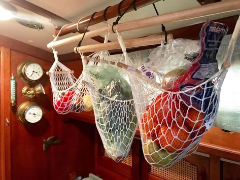 Boat Storage Ideas Space Saving, Boat Organization Ideas, Living On A Sailboat, Sailboat Living, Small Sailboats, Rectangular Baskets, Boat Storage, Hanger Clips, Boat Interior