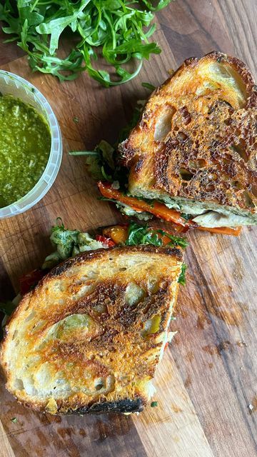 Lacey on Instagram: "Pesto Chicken Melt on Crispy Parm-Grilled Sourdough 🌿 Full recipe for this sandwich and the homemade basil pesto are both linked in bio 🌿 This sandwich was inspired by a sandwich on the menu at @kcsamericankitchen, the restaurant my parents owned and I worked at while I was in university. They’ve since sold the restaurant to two long standing employees and it’s as amazing as ever, so go check them out if you find yourself in Sonoma County, CA. The Pesto Chicken Melt at K Chicken Sandwich On Sourdough, Chicken Melt Sandwich, Sourdough Sandwich Recipes, Pesto Sandwich Recipe, Chicken Melt, Chicken Pesto Sandwich, Homemade Basil Pesto, Chicken Melts, Pesto Cheese