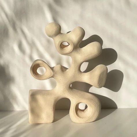 Carmelina | Ceramicist on Instagram: "The Oompa Loompa Sculpture 🤍 Love the White raku abstract sculpture with the organic finish🤍 H/36cm W/28cm #ceramics #pottery #sculptureabstract #sculpture #art #abstractart #oneofakind #unique #homedecor #decorhomestyle #interiordesign #interiorstyling #unglazedceramics #unglazed" Ceramics Abstract Sculpture, Abstract Ceramics Pottery, Subtractive Clay Sculpture, Clay Sculpture Art Project Ideas, Abstract Pottery Sculpture, Ceramics Ideas Sculpture, Abstract Clay Sculpture Ideas, Organic Sculpture Abstract, Abstract Ceramic Art