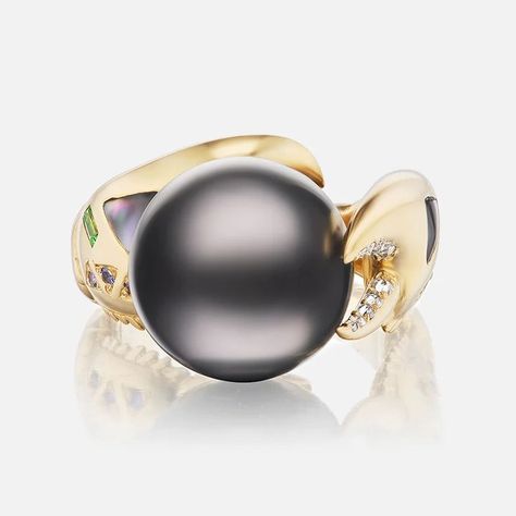 Stand Out with the "Dark Pearl Claw Ring"💍🔮 🔶Perfect for making a striking impression. 🔶Suitable for both casual and formal wear. 🔶Combines sophistication with a daring edge. 🔶Stands out in any jewelry collection. 🔶Classic design that remains stylish. 🔶Elevates your everyday look. Ring details 👉 18k yellow gold dark pearl claw ring with mother of pearl inlay and tsavorite baguettes and purple sapphires gems. Representing protection + prosperity, the Claw ring is engineered to hold a single ... Dark Pearl, Claw Ring, Mother Of Pearl Inlay, Pearl Inlay, Purple Sapphire, The Claw, Luxury Rings, Pearl Grey, Ring Collections